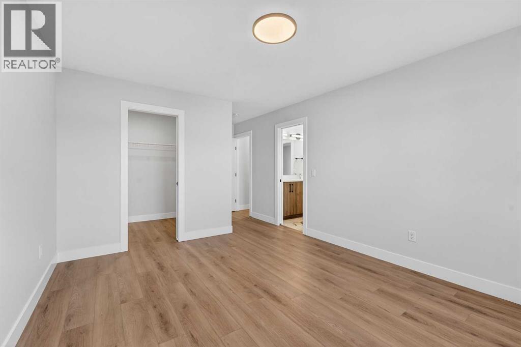 202 Kinniburgh Loop, Chestermere, AB - Indoor Photo Showing Other Room