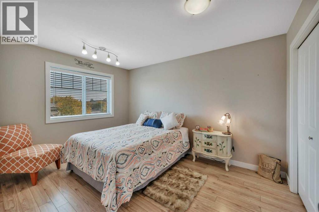 3RD BEDROOM UPSTAIRS - 232 Wiley Crescent, Red Deer, AB - Indoor Photo Showing Bedroom