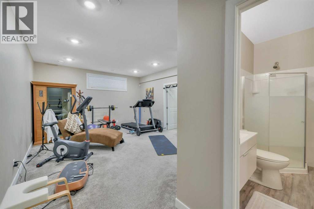 RED ROOM BASEMENT - 232 Wiley Crescent, Red Deer, AB - Indoor Photo Showing Gym Room