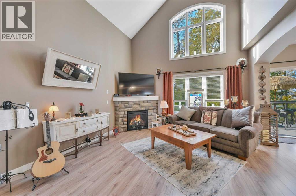LIVING ROOM - 232 Wiley Crescent, Red Deer, AB - Indoor Photo Showing Living Room With Fireplace
