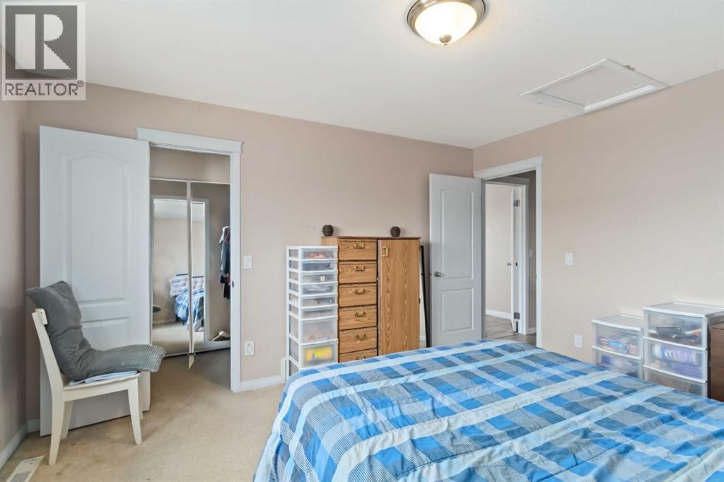 228 Paris Crescent, Fort Mcmurray, AB - Indoor Photo Showing Bedroom