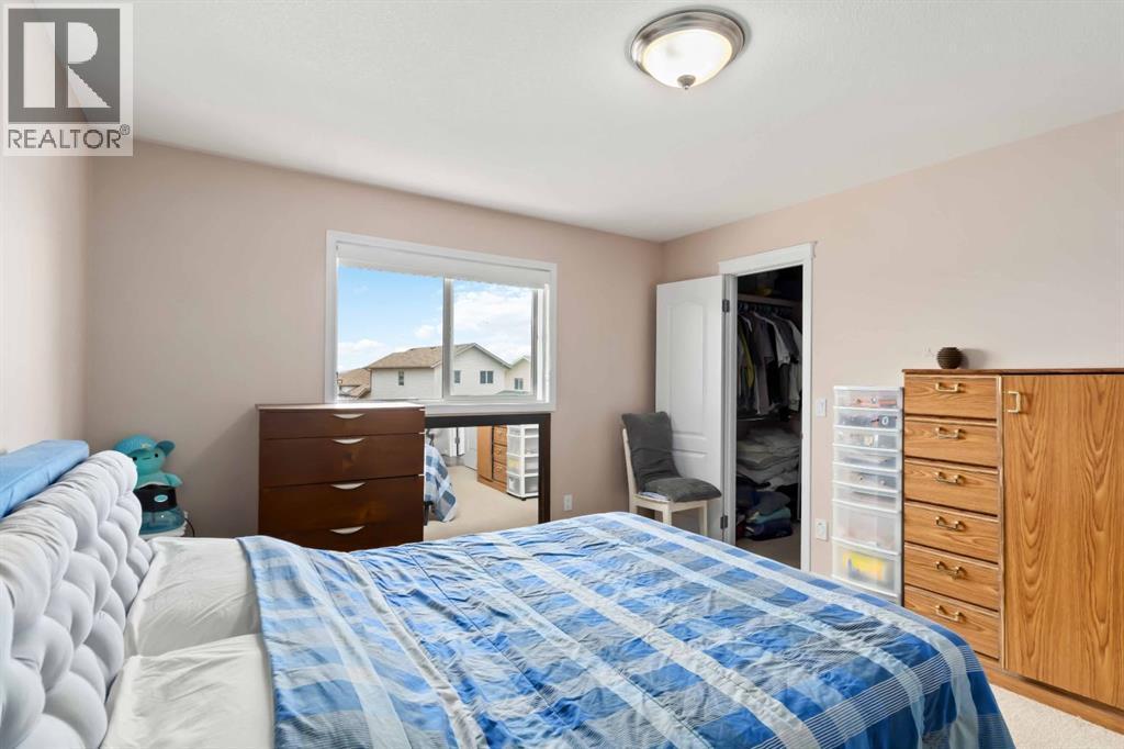 228 Paris Crescent, Fort Mcmurray, AB - Indoor Photo Showing Bedroom