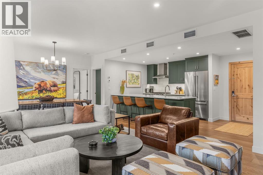 313, 1408 Spring Creek Gate, Canmore, AB - Indoor Photo Showing Living Room
