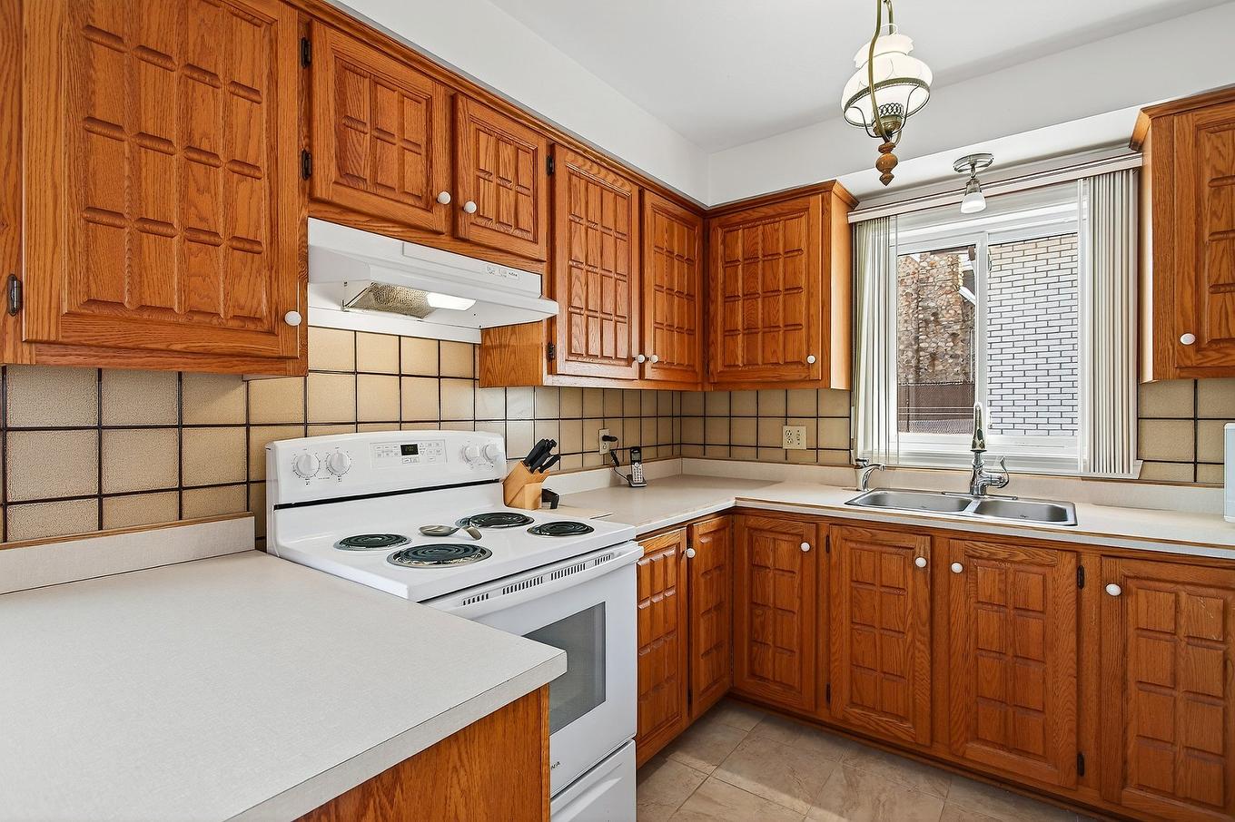 Cuisine - 12585 42E Avenue (R.-D.-P.), Montréal (Rivière-Des-Prairies/Pointe-Aux-Trembles), QC - Indoor Photo Showing Kitchen With Double Sink