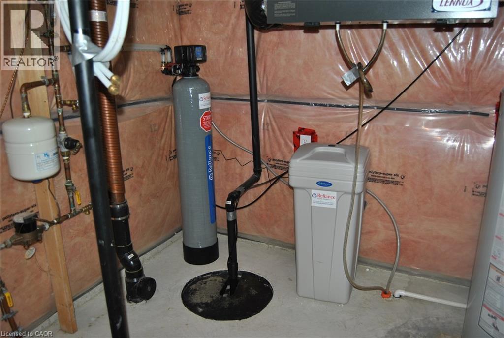 Utility room with gas water heater - 154 Harding Street, Kitchener, ON - Indoor Photo Showing Basement