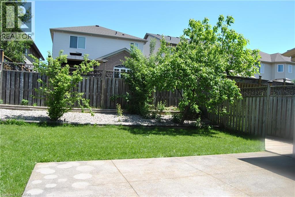 Fenced backyard featuring a patio - 154 Harding Street, Kitchener, ON - Outdoor