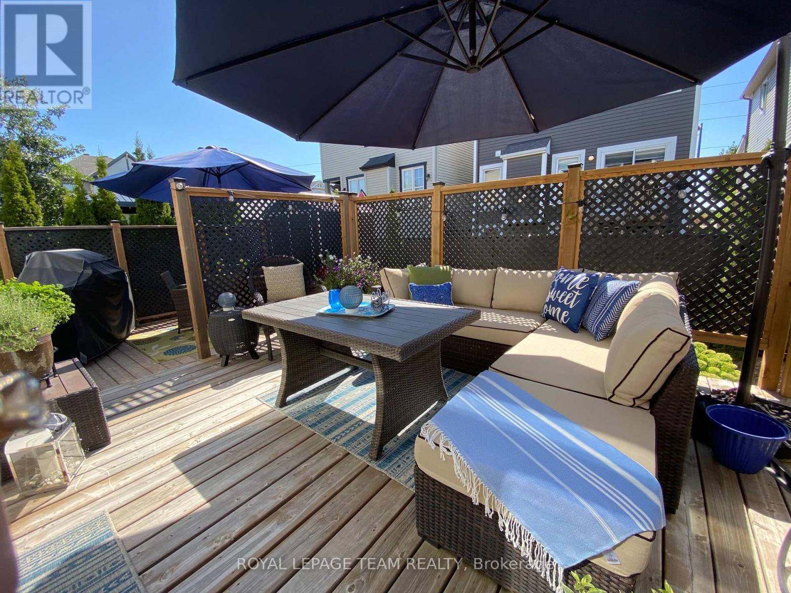 Summer 2025 photo upper tier deck off patio doors - 979 Shimmerton Circle, Ottawa, ON - Outdoor With Deck Patio Veranda With Exterior