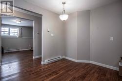 View from Apt eat in kitchen into Living room -