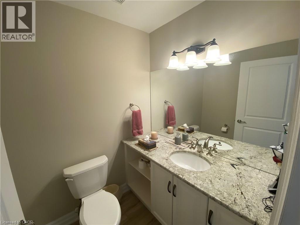 Bathroom with vanity and toilet - 36 Mckenna Court, Hamilton, ON - Indoor Photo Showing Bathroom