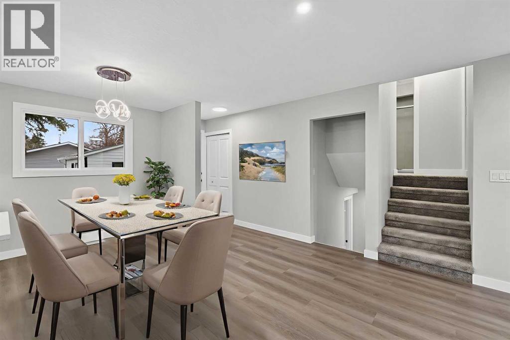 Virtually Staged - 127 Lynnview Way Se, Calgary, AB - Indoor Photo Showing Dining Room