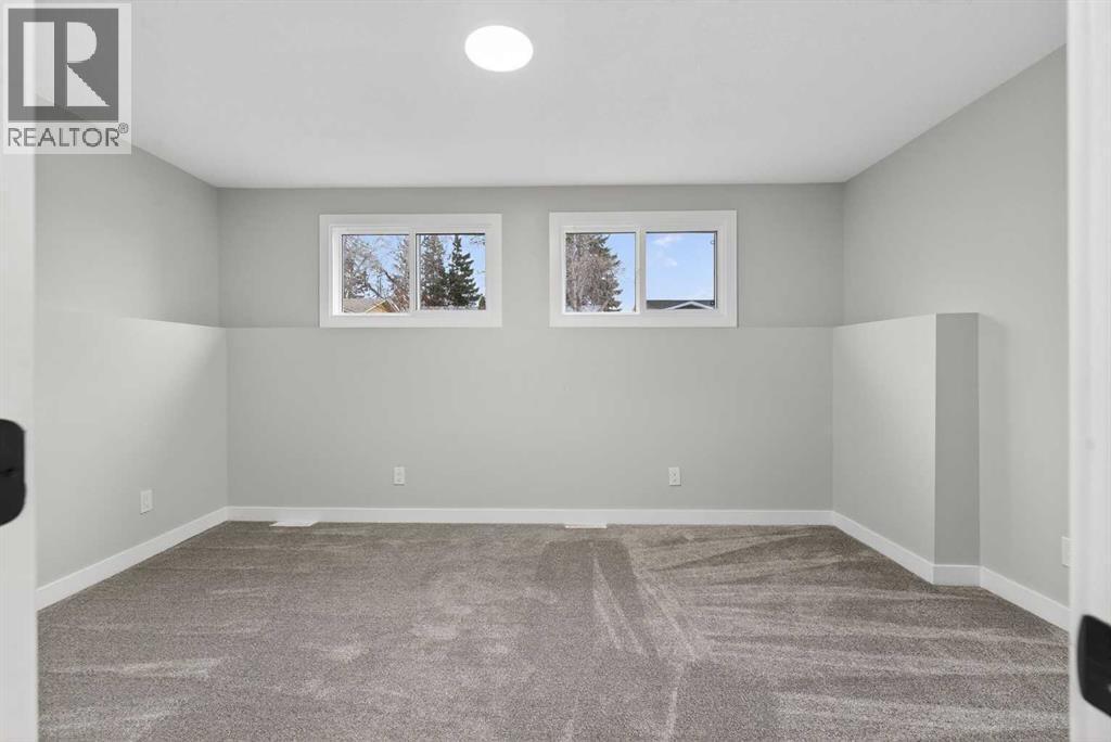 127 Lynnview Way Se, Calgary, AB - Indoor Photo Showing Other Room