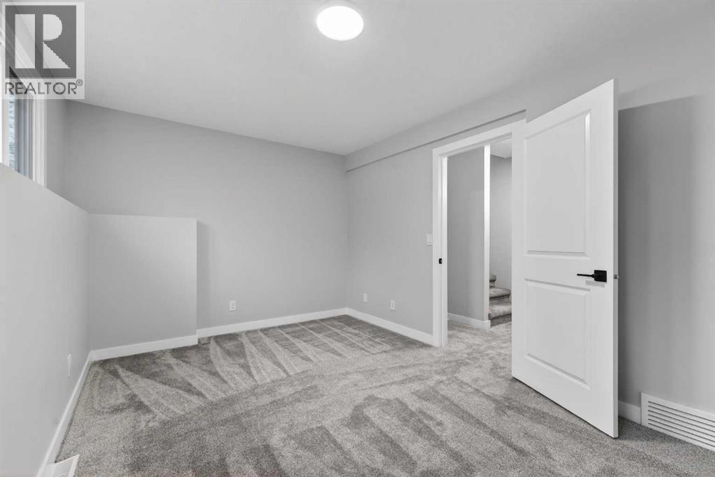 127 Lynnview Way Se, Calgary, AB - Indoor Photo Showing Other Room
