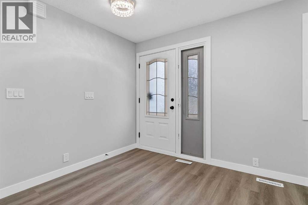 127 Lynnview Way Se, Calgary, AB - Indoor Photo Showing Other Room