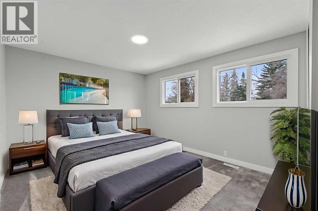 Virtually Staged - 127 Lynnview Way Se, Calgary, AB - Indoor Photo Showing Bedroom