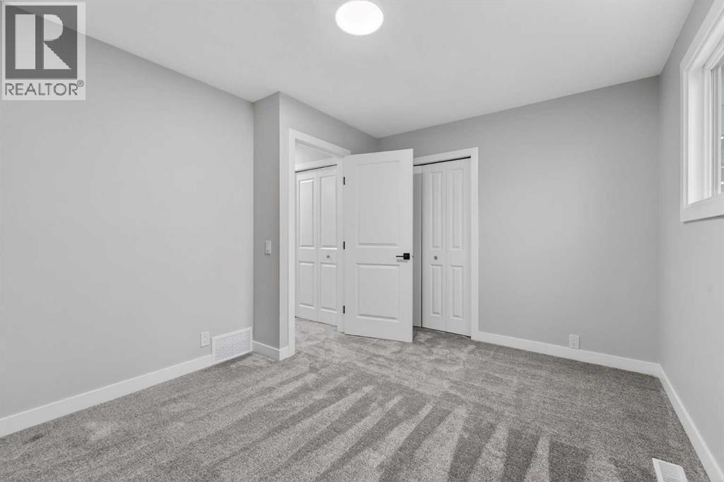 127 Lynnview Way Se, Calgary, AB - Indoor Photo Showing Other Room
