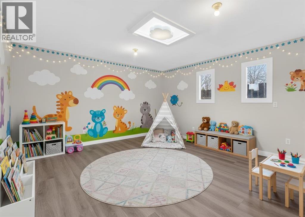 Backyard Room as Kids Play Room, Virtually Staged - 127 Lynnview Way Se, Calgary, AB - Indoor Photo Showing Bedroom