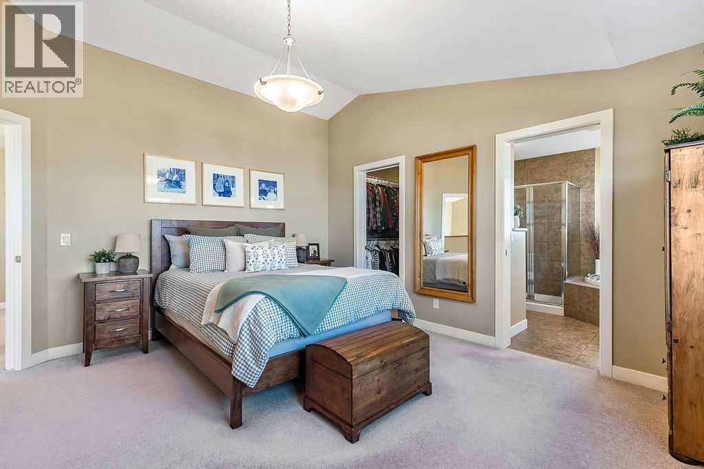 718 Hamptons Bay Se, High River, AB - Indoor Photo Showing Bedroom
