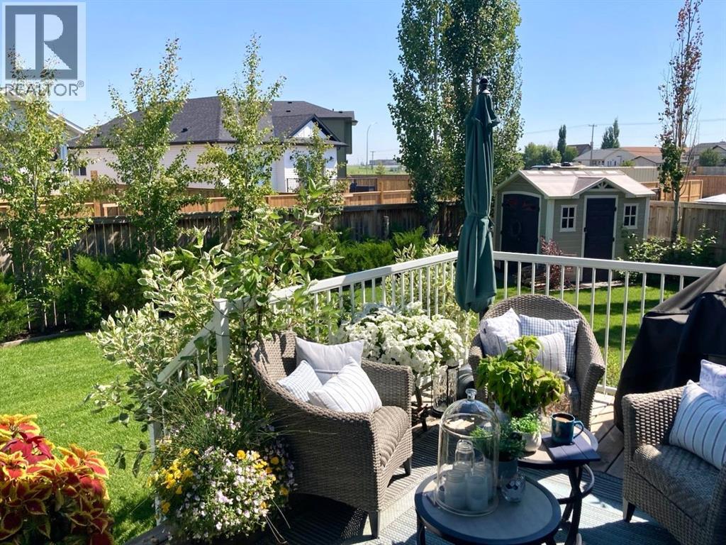 718 Hamptons Bay Se, High River, AB - Outdoor With Deck Patio Veranda