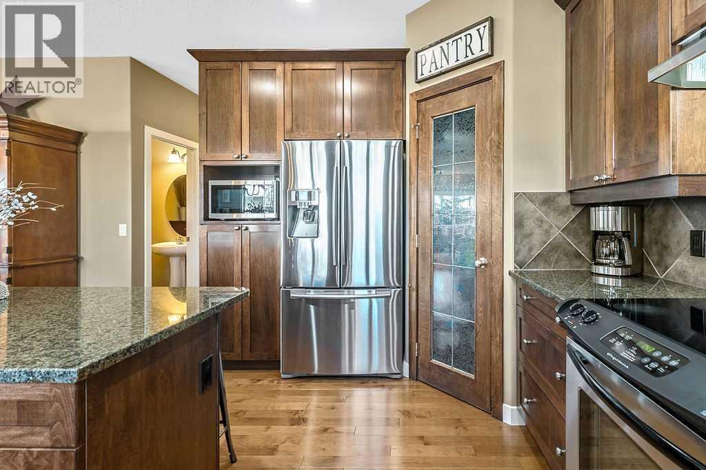 718 Hamptons Bay Se, High River, AB - Indoor Photo Showing Kitchen With Stainless Steel Kitchen With Upgraded Kitchen
