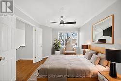 Virtually staged primary w double doors -