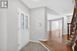 Spacious foyer w inside entry & coat closet -
