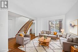 Spacious living room w hardwood flooring -