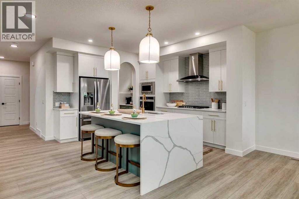 71 Emerson Crescent, Okotoks, AB - Indoor Photo Showing Kitchen With Stainless Steel Kitchen With Upgraded Kitchen