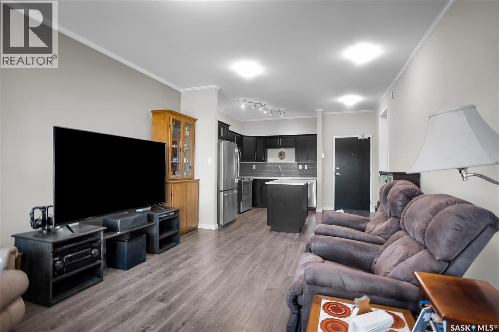 216 545 Hassard Close, Saskatoon, SK - Indoor Photo Showing Living Room