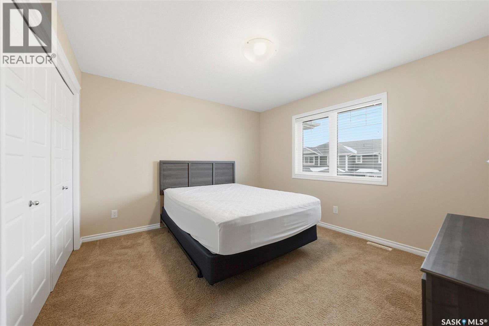 #3 115 Veltkamp Crescent, Saskatoon, SK - Indoor Photo Showing Bedroom