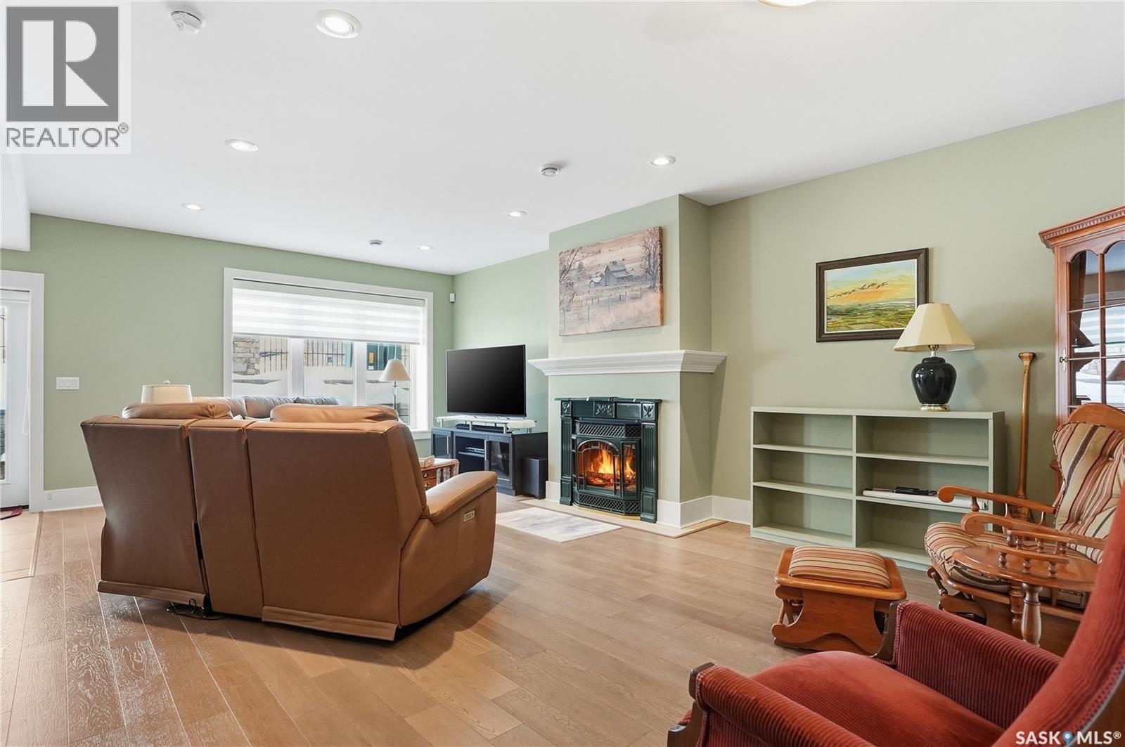 29 115 Meadows Boulevard, Saskatoon, SK - Indoor Photo Showing Living Room With Fireplace