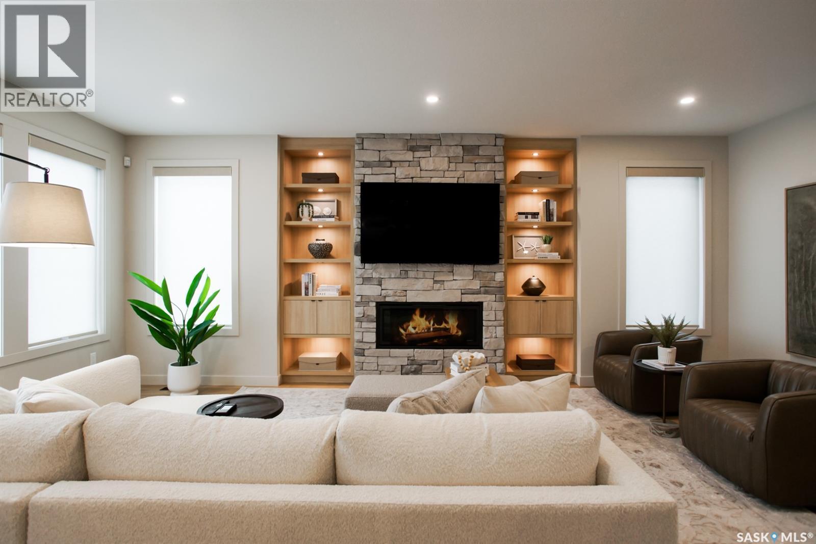 4158 Fieldstone Way, Regina, SK - Indoor Photo Showing Living Room With Fireplace