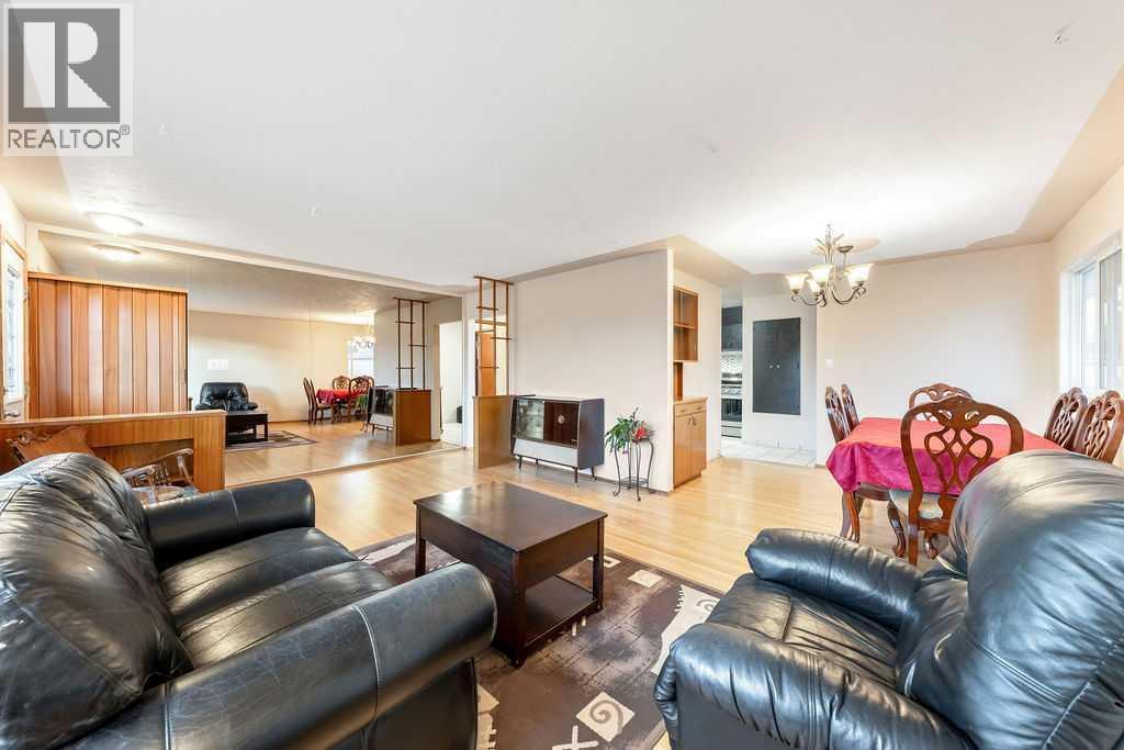 9136 Allison Drive Se, Calgary, AB - Indoor Photo Showing Living Room