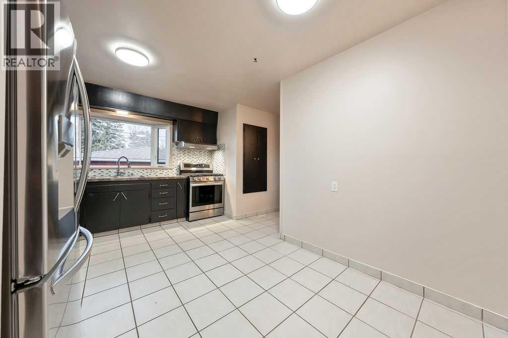 9136 Allison Drive Se, Calgary, AB - Indoor Photo Showing Dining Room