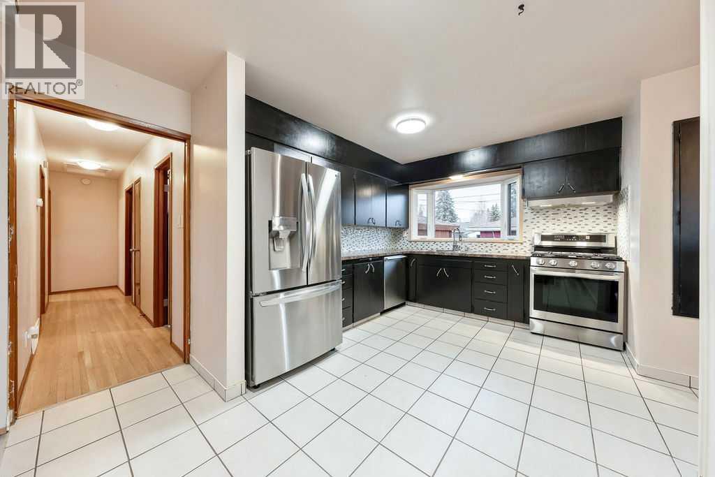 9136 Allison Drive Se, Calgary, AB - Indoor Photo Showing Kitchen