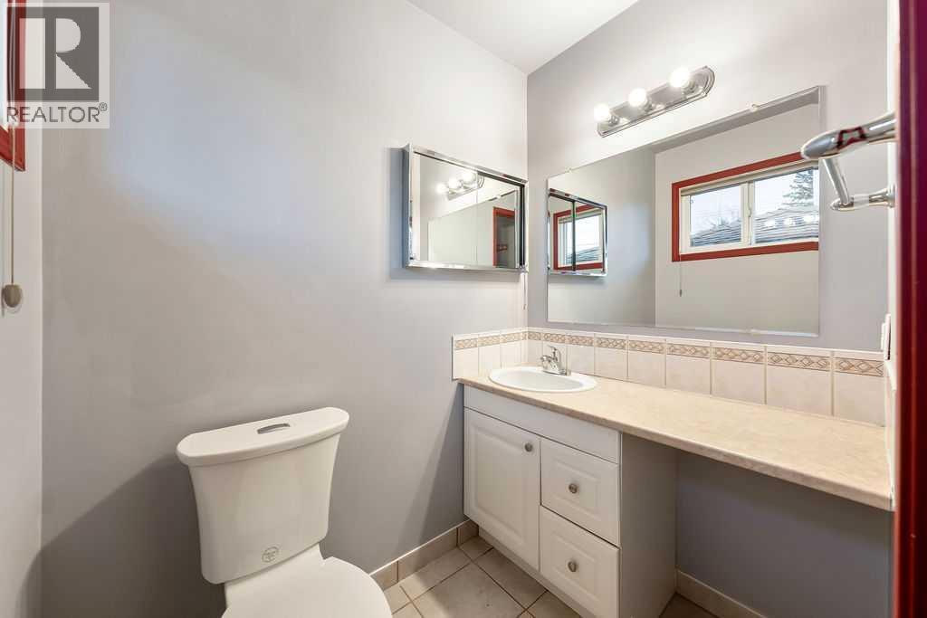 9136 Allison Drive Se, Calgary, AB - Indoor Photo Showing Bedroom