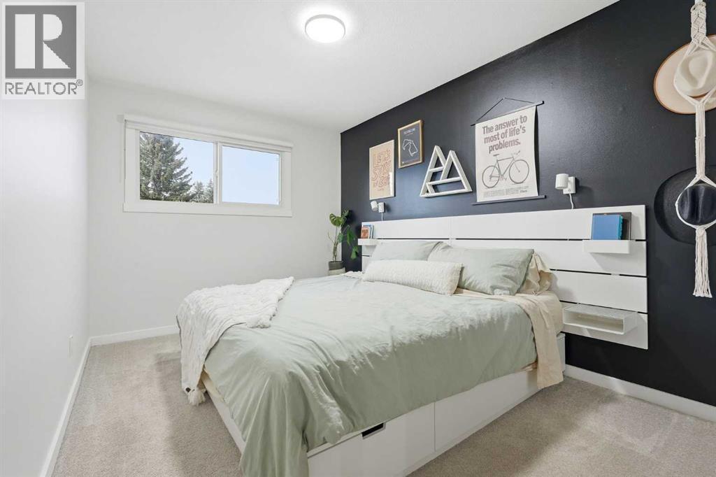 Primary Bedroom with walk in closet and 5pc ensuite - 711 101 Avenue Sw, Calgary, AB - Indoor Photo Showing Bedroom