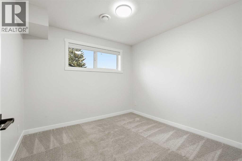 Illegal Suite 1-bed unit with full bathroom and washer and dyer - 711 101 Avenue Sw, Calgary, AB - Indoor Photo Showing Other Room