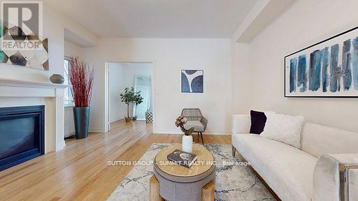 3964 Thomas Alton Boulevard, Burlington, ON - Indoor Photo Showing Living Room With Fireplace