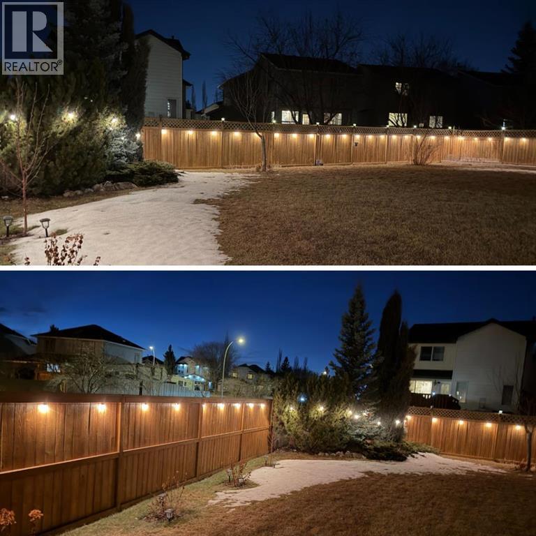 The exterior lights are on at night - 328 Douglas Glen Heath Se, Calgary, AB - Outdoor