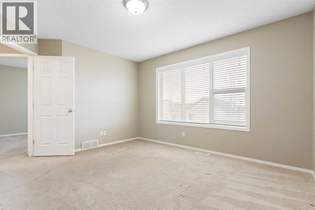 Primary bedroom - 129 Evansbrooke Way Nw, Calgary, AB - Indoor Photo Showing Other Room