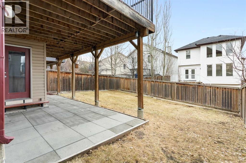 Patio, covered, rear yard - 129 Evansbrooke Way Nw, Calgary, AB - Outdoor With Deck Patio Veranda With Exterior