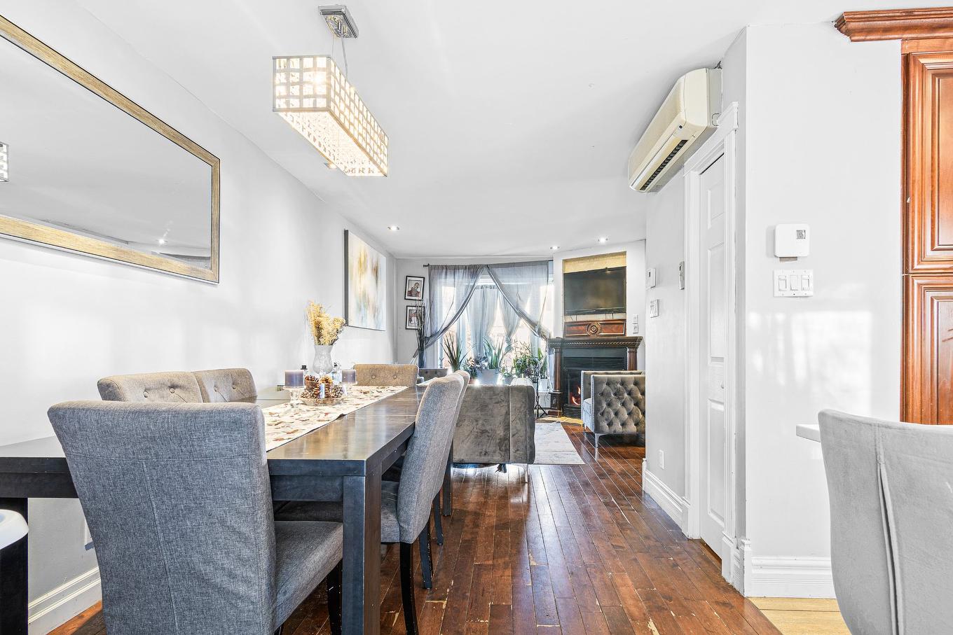 Dining room - 1601 Rue Des Bernaches, Terrebonne (La Plaine), QC - Indoor Photo Showing Dining Room With Fireplace
