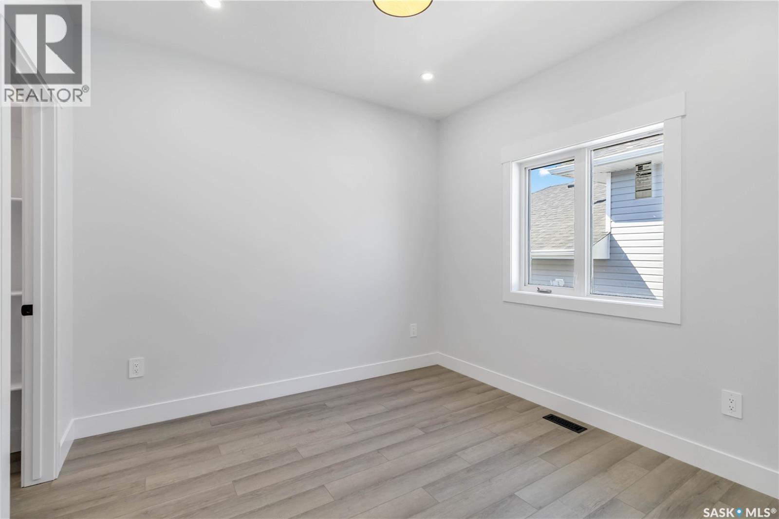 838 Ballesteros Crescent, Warman, SK - Indoor Photo Showing Other Room