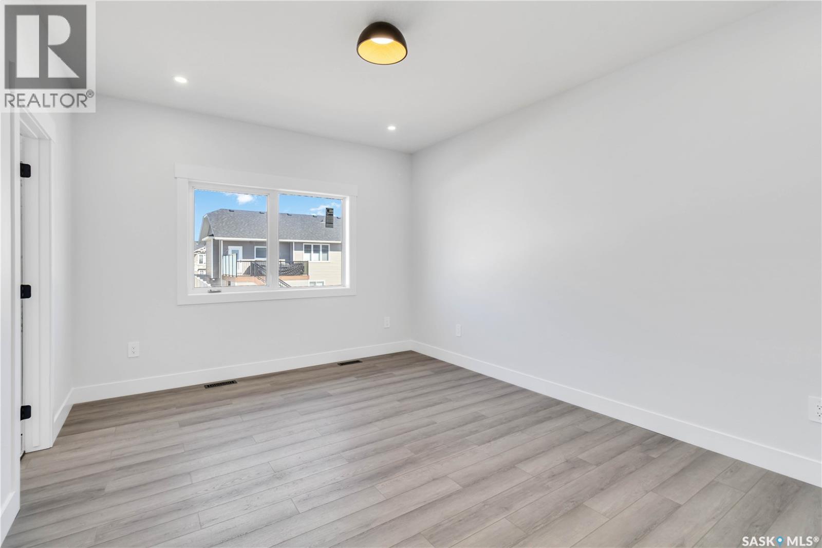 838 Ballesteros Crescent, Warman, SK - Indoor Photo Showing Other Room