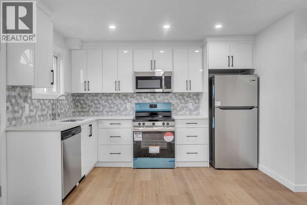 63 Penworth Close Se, Calgary, AB - Indoor Photo Showing Kitchen With Stainless Steel Kitchen