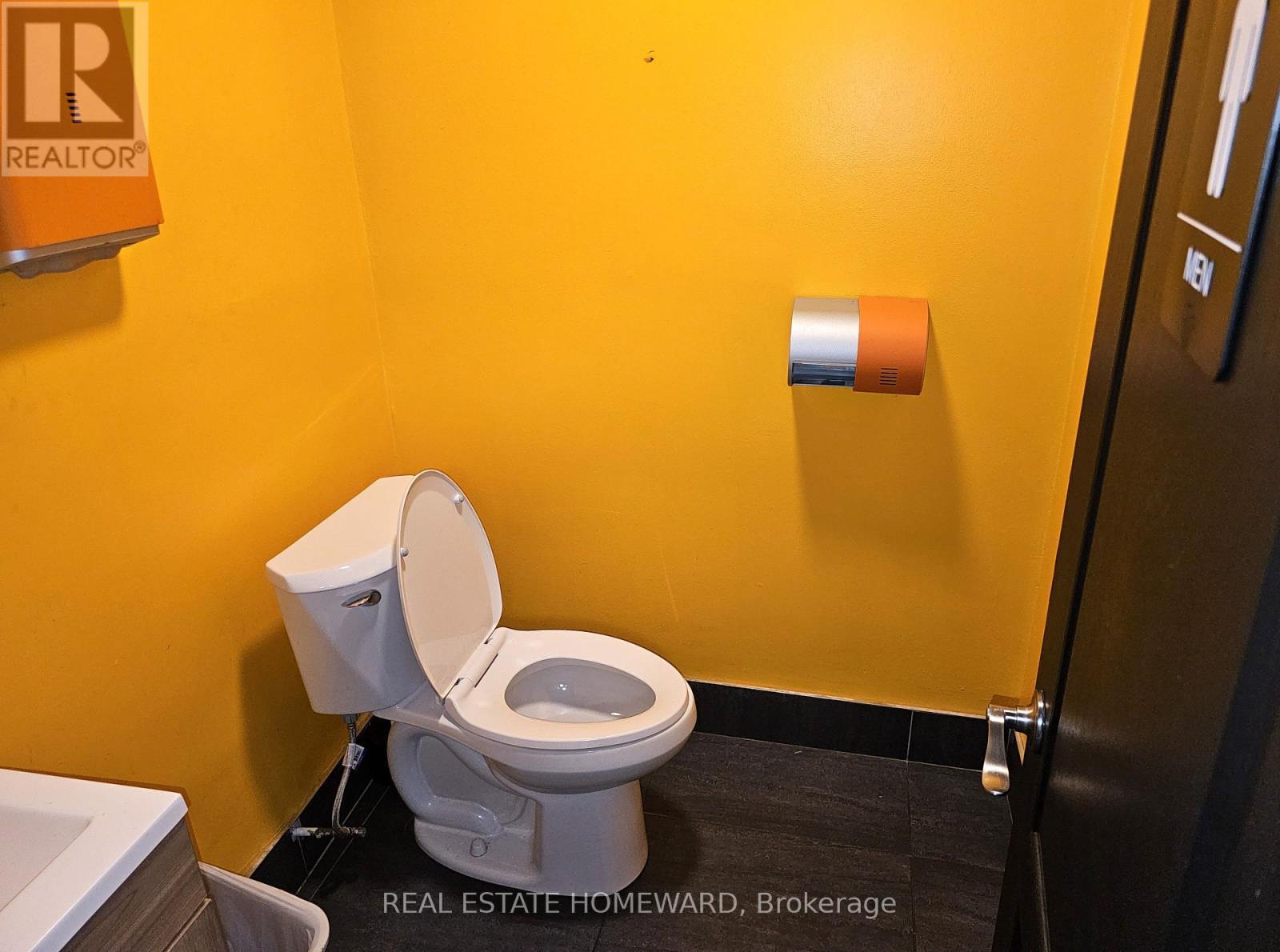 Men's washroom - Main & Basement - 3032 Danforth Avenue, Toronto, ON
