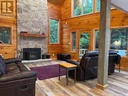 Open to vaulted ceiling Great Room w/fireplace. -