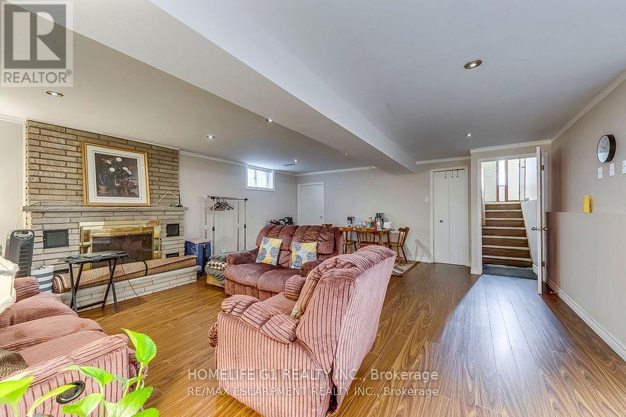 27 Gilcrest Street, Hamilton, ON - Indoor Photo Showing Other Room With Fireplace