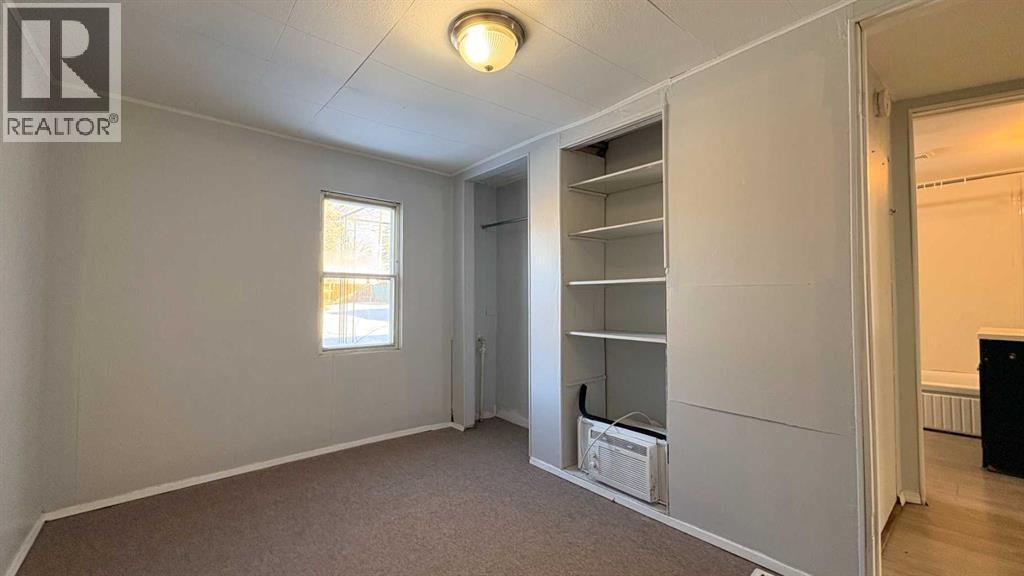 Primary bedroom! - 622 5 Avenue, Wainwright, AB - Indoor Photo Showing Other Room