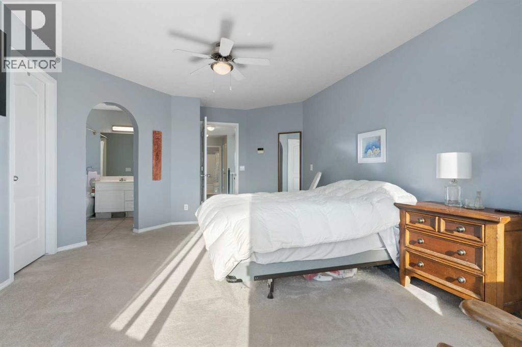 202 Schooner Close Nw, Calgary, AB - Indoor Photo Showing Bedroom